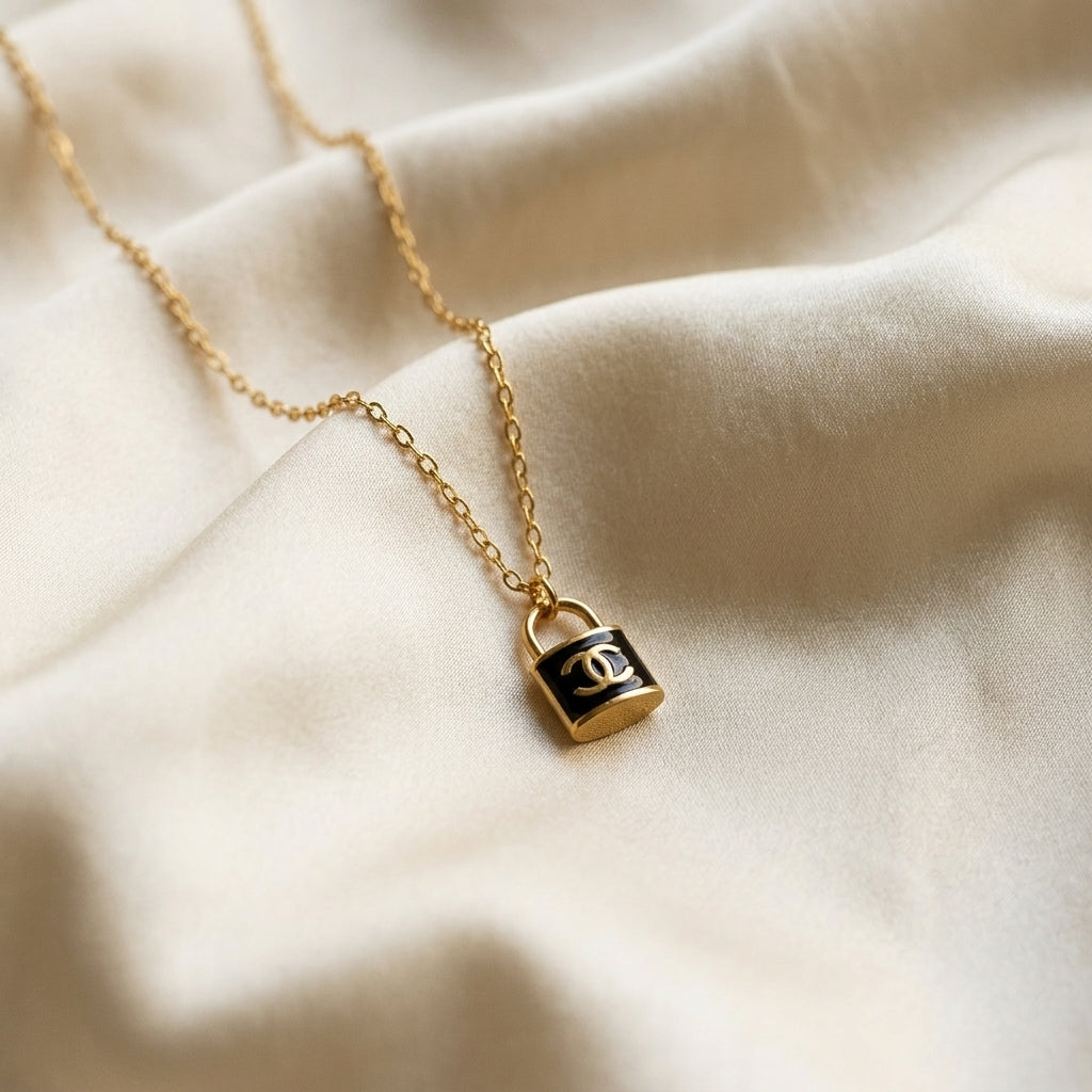 Gold Padlock Pendant Necklace with Black Charm