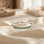 Elegant Silver-Tone Bracelet with Emerald Green and Clear Crystal Stones