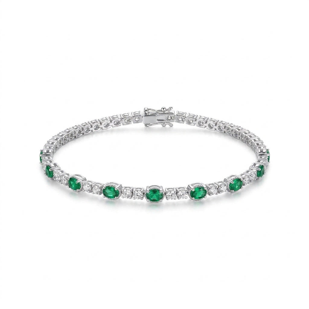 Elegant Silver-Tone Bracelet with Emerald Green and Clear Crystal Stones