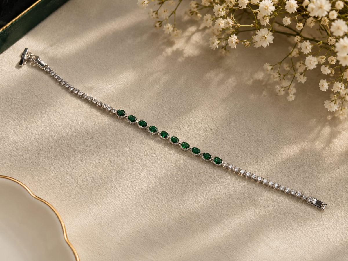 Elegant Silver-Tone Bracelet with Emerald Green and Clear Crystal Stones