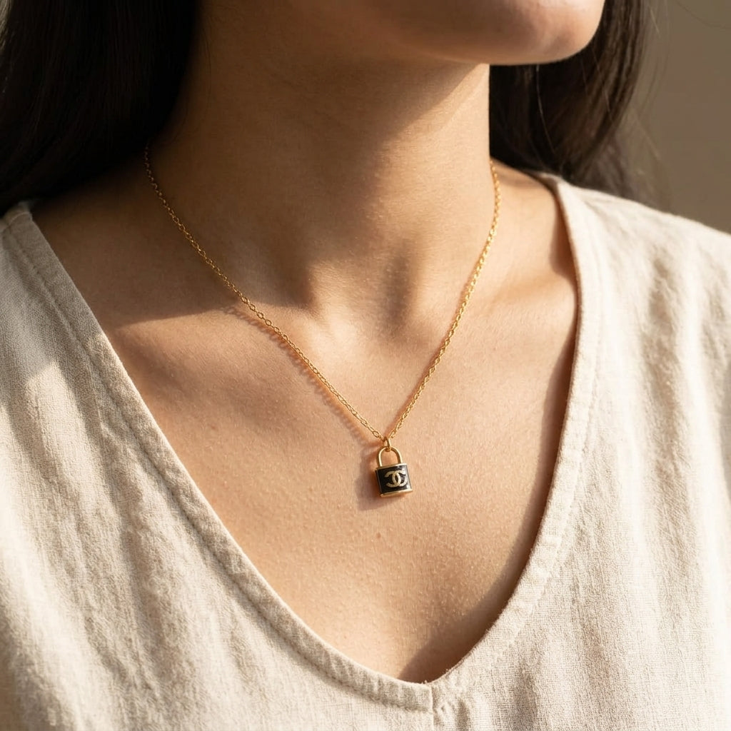 Gold Padlock Pendant Necklace with Black Charm