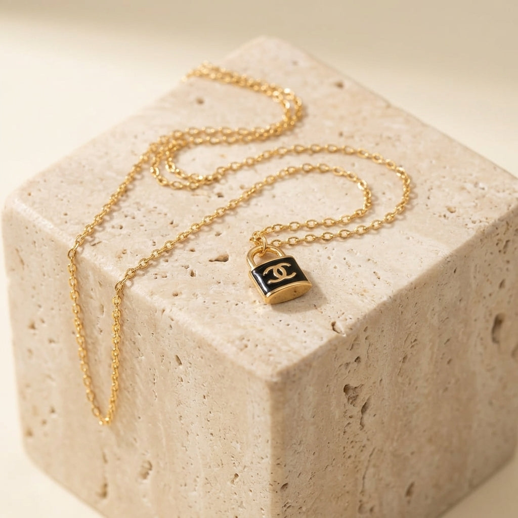Gold Padlock Pendant Necklace with Black Charm