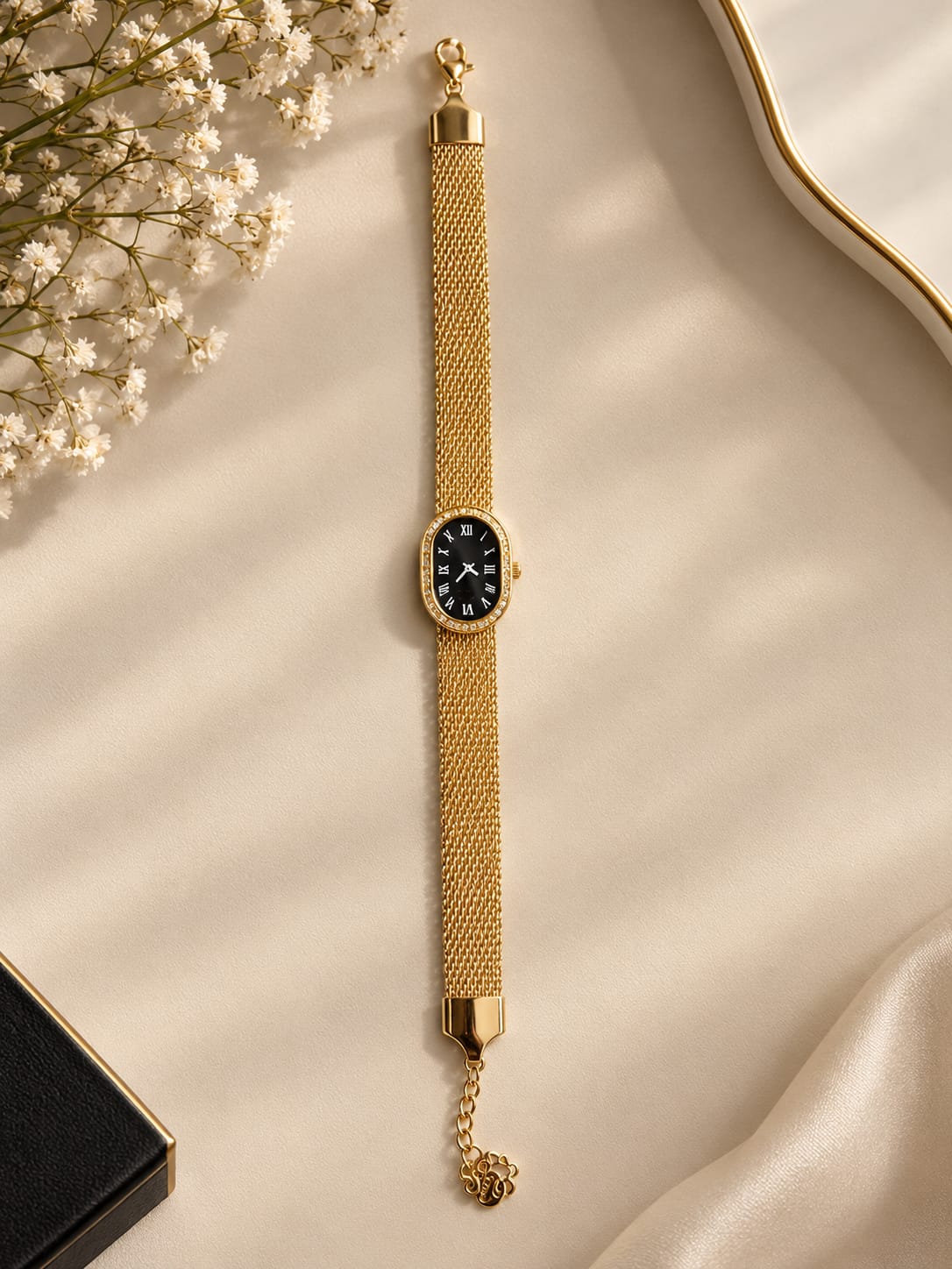 Gold Mesh Bracelet Watch with Black Oval Dial and Roman Numerals
