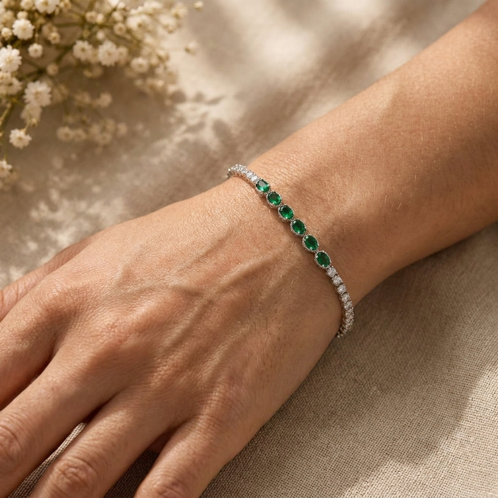 Elegant Silver-Tone Bracelet with Emerald Green and Clear Crystal Stones