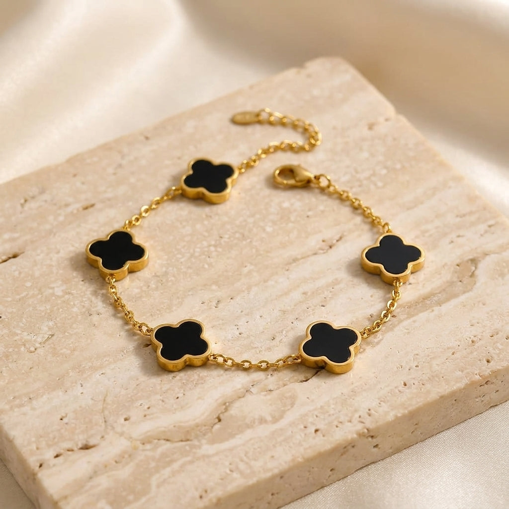 Elegant Gold-Tone Stainless Steel Bracelet with Black Clover Charms