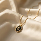 Gold and Black Floral Pendant Necklace