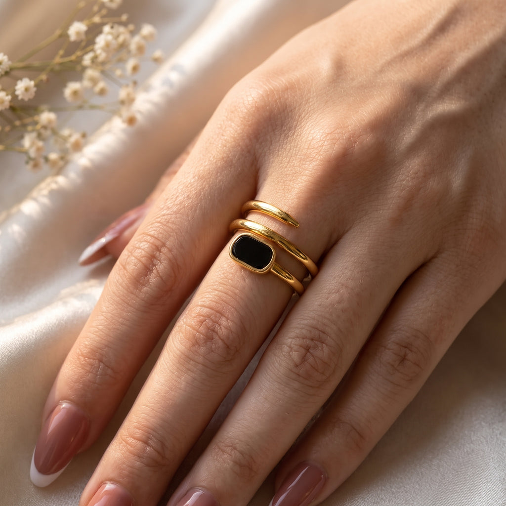 Elegant Gold-Tone Black Stone Spiral Ring for Women