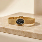 Gold Mesh Bracelet Watch with Black Oval Dial and Roman Numerals