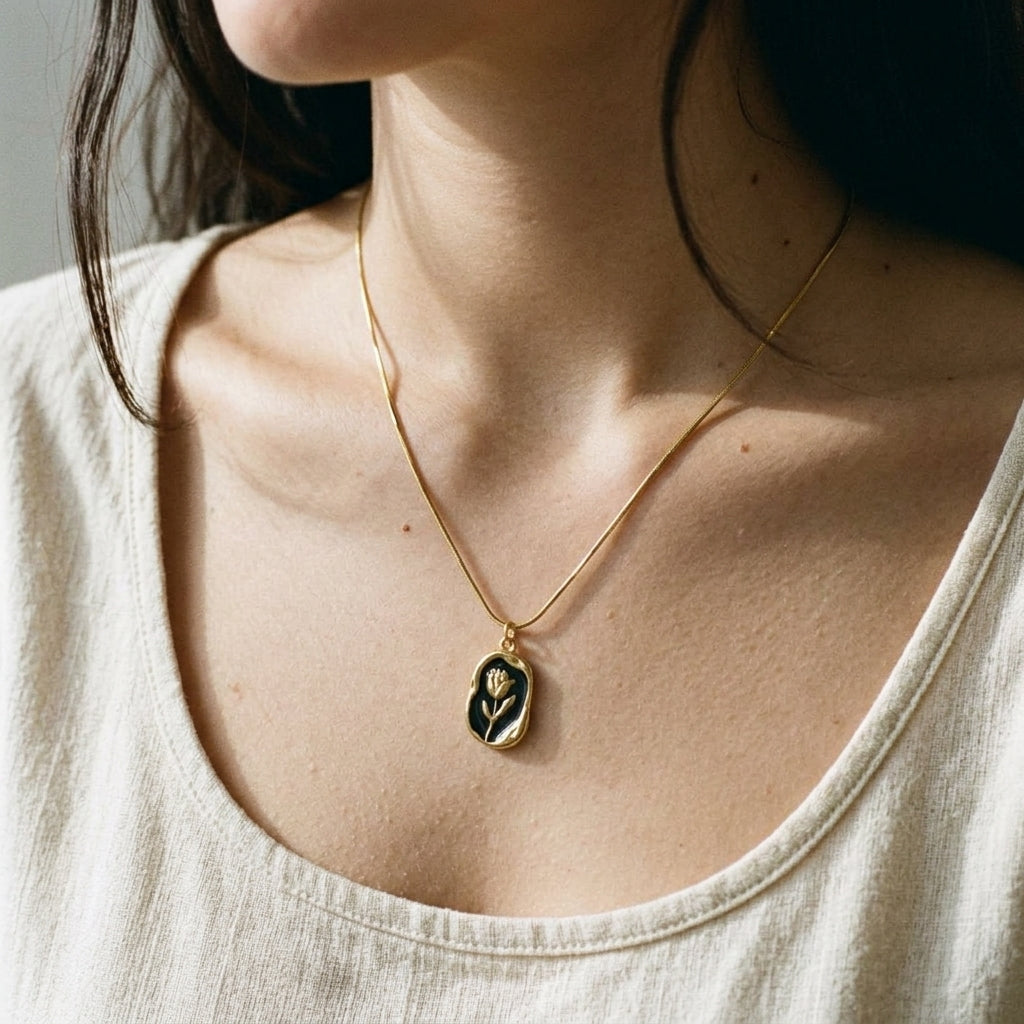 Gold and Black Floral Pendant Necklace