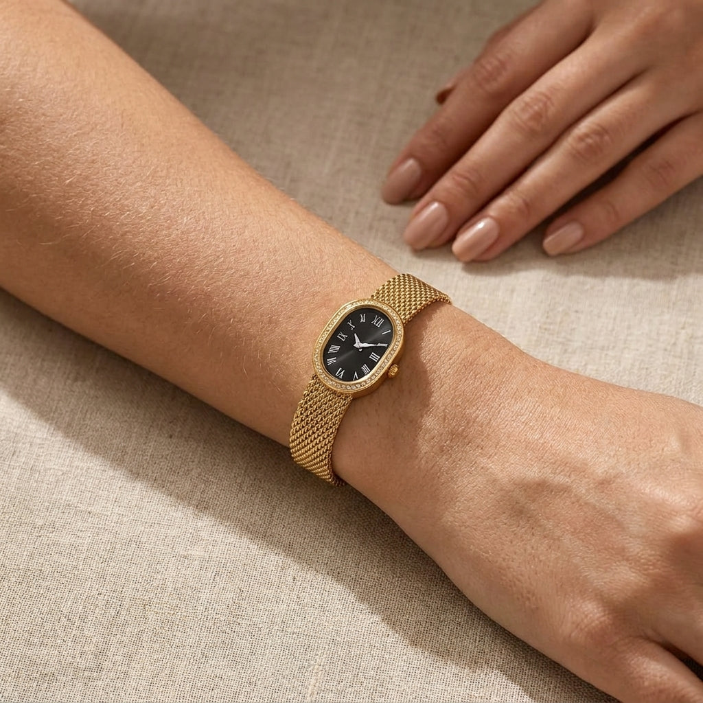 Gold Mesh Bracelet Watch with Black Oval Dial and Roman Numerals