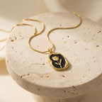 Gold and Black Floral Pendant Necklace