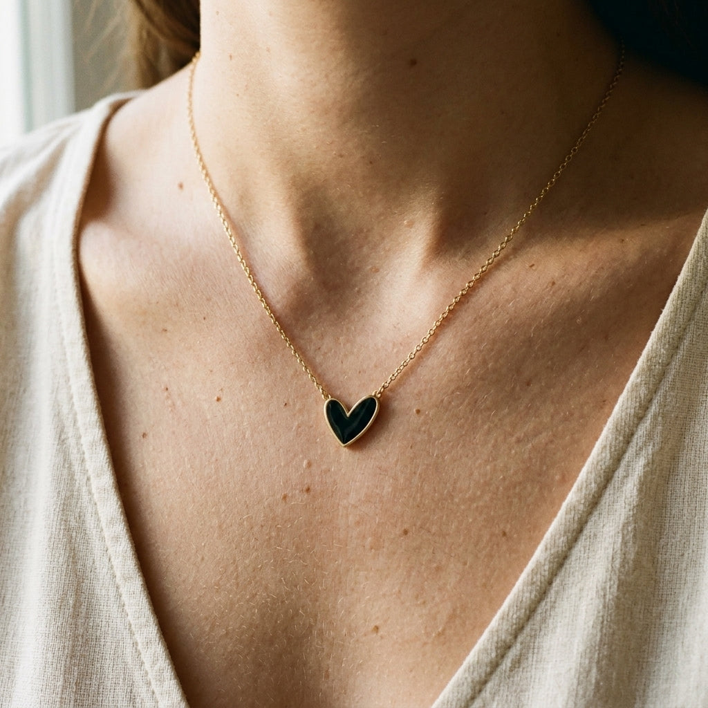 Black Heart Pendant Necklace – Gold Tone