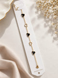 Black & White Clover Charm Bracelet – Gold-Tone