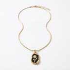 Gold and Black Floral Pendant Necklace