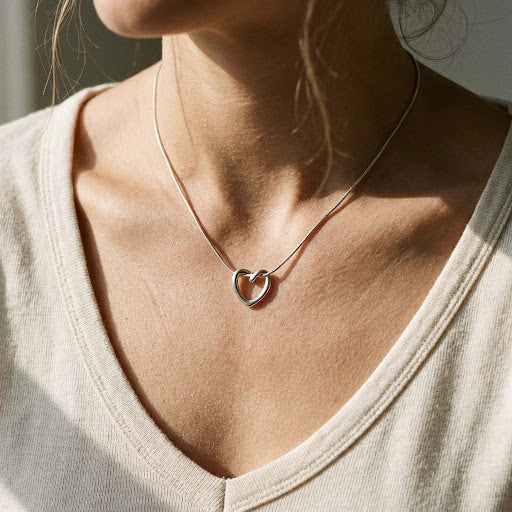 Black Heart Pendant Necklace with Gold-Tone Chain